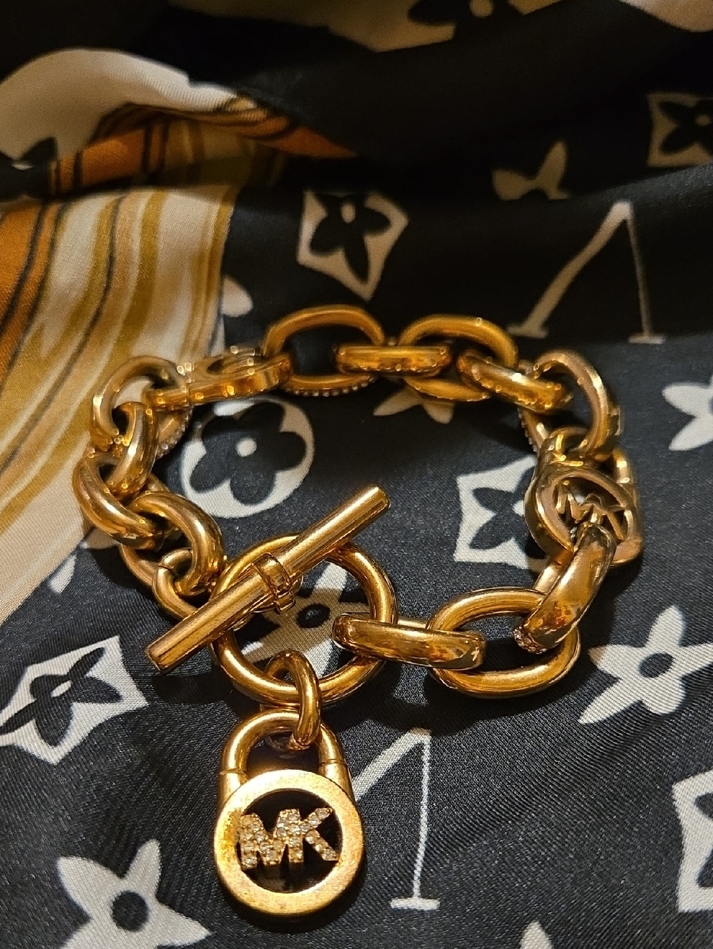 Michael Kors Gold Chain Toggle Bracelet with MK Padlock Charm